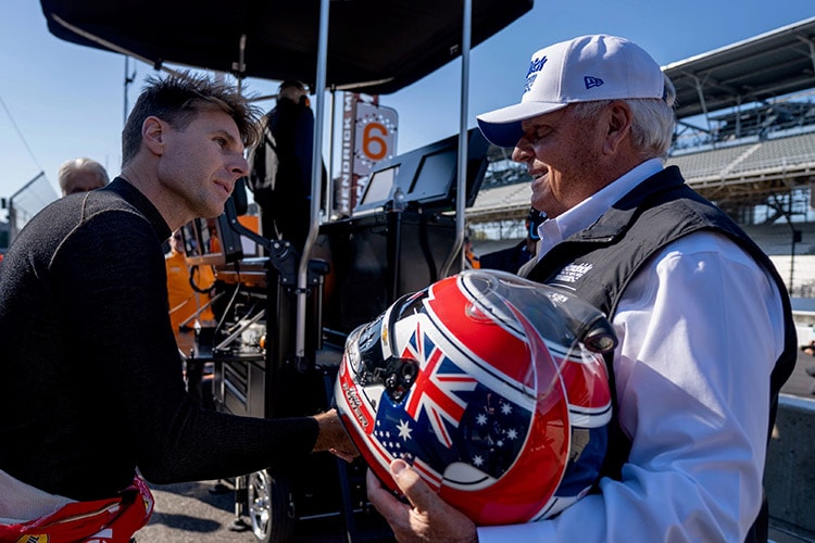 Will Power Gifts Helmet to Rick Hendrick at Indy 2.jpg
