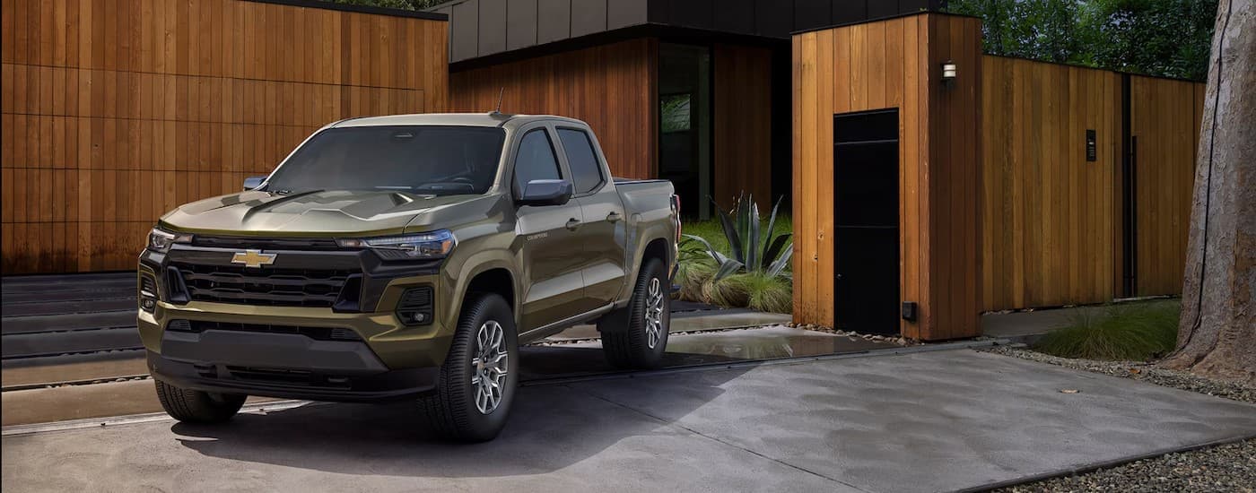 A green 2026 Chevy Colorado parked after viewing trucks for sale near Clayton.