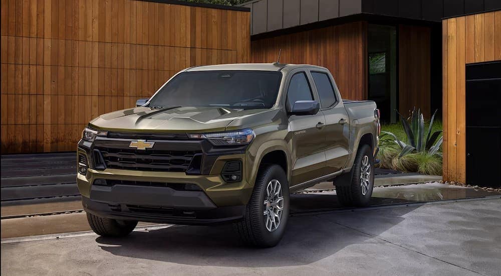 A green 2025 Chevy Colorado Z71 is shown parked after visiting a car dealer near Charleston.